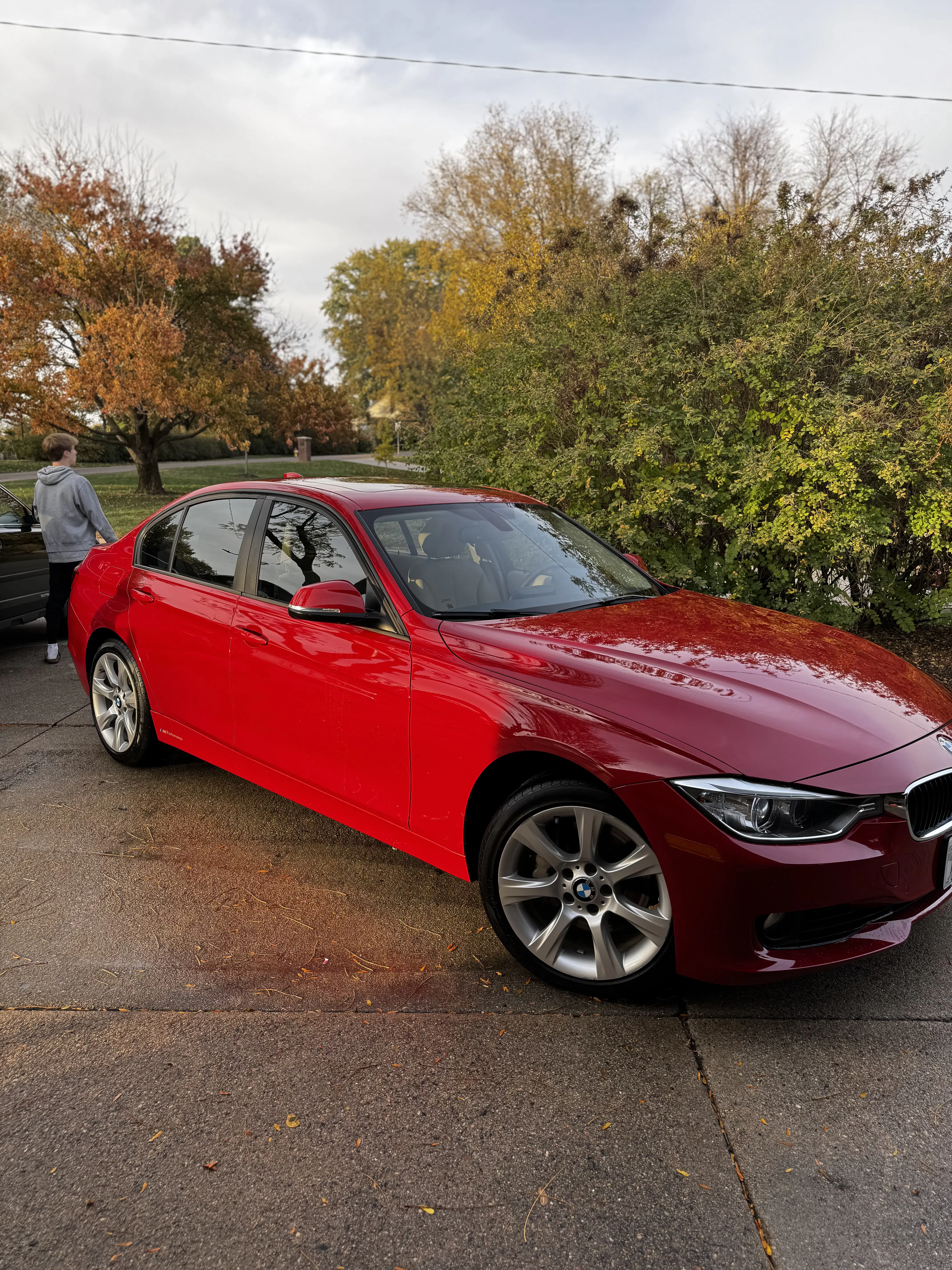 Ceramic coating on red BMW sedan - Detail Omaha